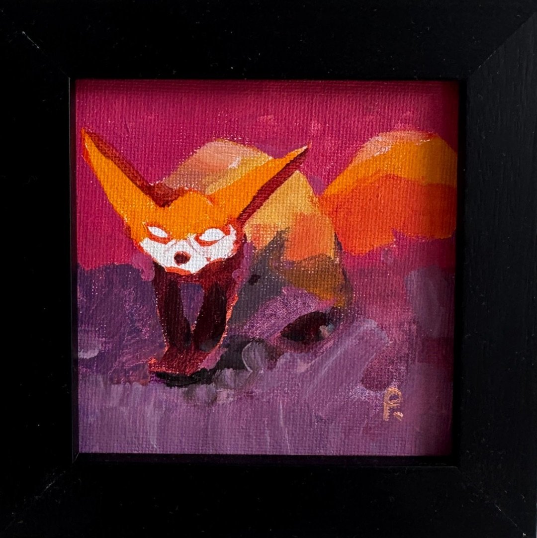 Orange fennec fox on a pink and violet ground, in a black frame