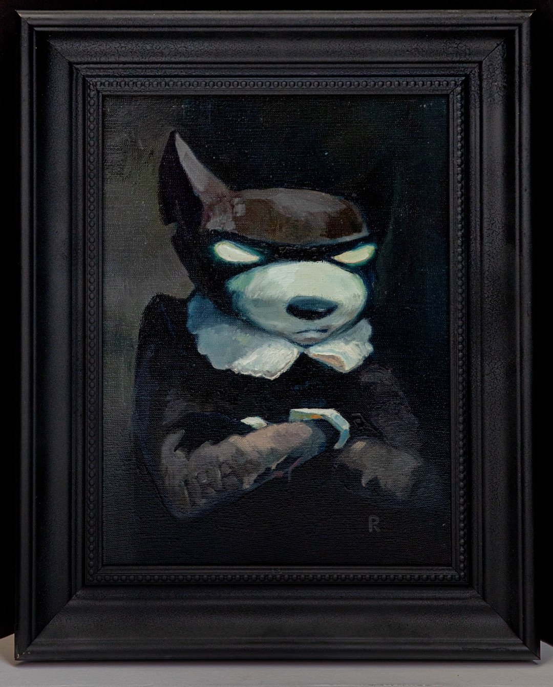 Dark portrait with pale yellow eyes holding something close